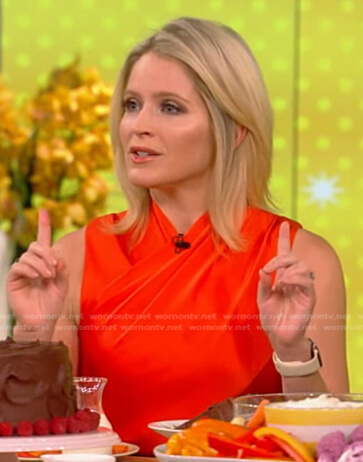 Sarah’s orange cross front top and black high waist pants on The View