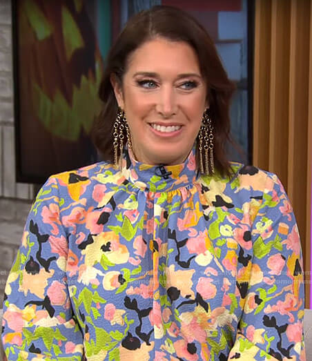 Sarah Gelman’s blue floral mock-neck blouse on CBS Mornings
