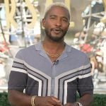 Scott’s grey colorblock knit shirt on Access Hollywood