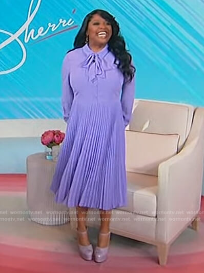 Sherri’s purple pleated dress on Sherri