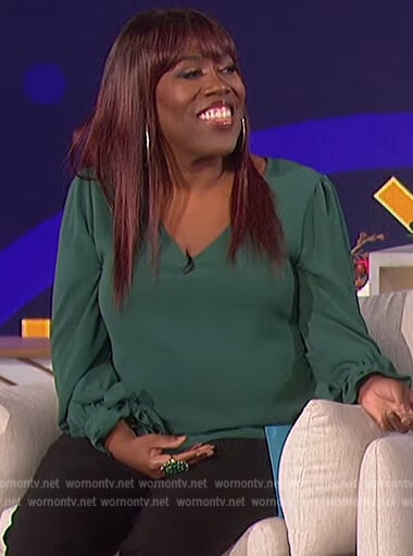 Sheryl’s green tie cuff blouse on The Talk