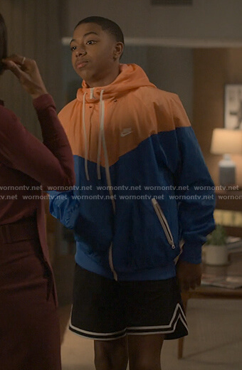 Spenser's orange and blue colorblock jacket on Reasonable Doubt