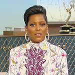 Tamron’s floral blouse with butterfly applique on Tamron Hall Show