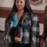 Thea’s black plaid jacket on All American Homecoming