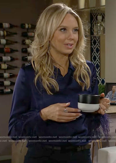 Abby’s navy feather cuff shirt on The Young and the Restless