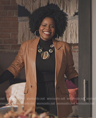 Amara's brown leather blazer and necklace on All American Homecoming