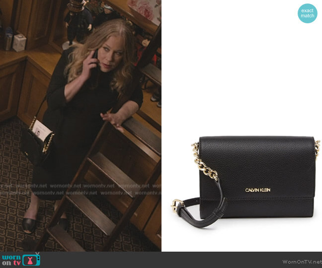 Leather Chain Wallet by Calvin Klein worn by Jen Harding (Christina Applegate) on Dead to Me