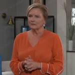 Carolyn’s orange blouse with white piping on General Hospital