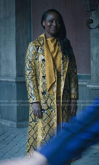 Gabrielle’s yellow snake leather coat and paisley blouse on Wednesday