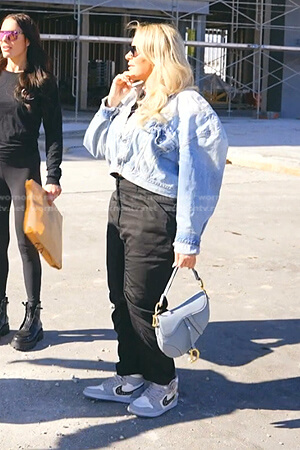 Heather’s cropped denim jacket and leather bag on The Real Housewives of Salt Lake City