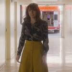 Judy’s black printed blouse and skirt on Dead to Me