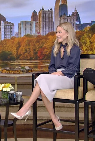 Kelly’s navy blouse and grey pencil skirt on Live with Kelly and Ryan