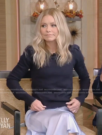 Kelly’s navy puff sleeve sweater on Live with Kelly and Ryan