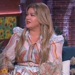 Kelly’s print blouse and mini skirt on The Kelly Clarkson Show