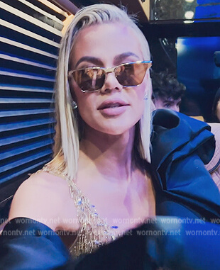 Khloe’s gold metallic sunglasses on The Kardashians