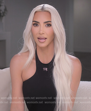 Kim's black confessional top on The Kardashians