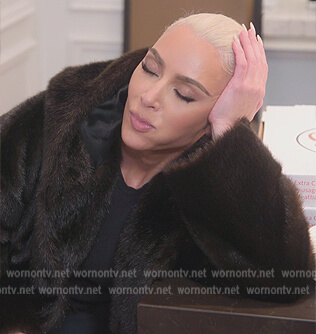 Kim’s brown fur coat on The Kardashians