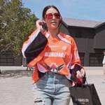 Kim’s Balenciaga jersey and distressed jeans on The Kardashians