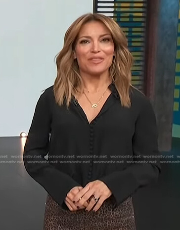 Kit’s black button down blouse on Access Hollywood