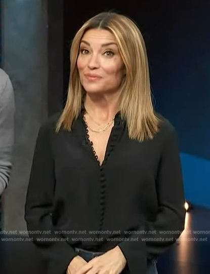 Kit’s black button down blouse on Access Hollywood