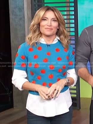 Kit’s blue strawberry print sweater on Access Hollywood