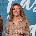 Kit’s beige python print blouse on Access Hollywood