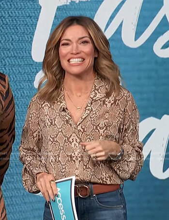 Kit’s beige python print blouse on Access Hollywood