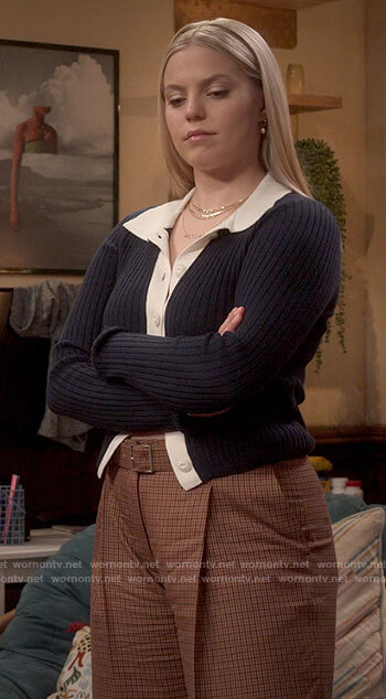 Leighton's navy cardigan with white trim on The Sex Lives of College Girls