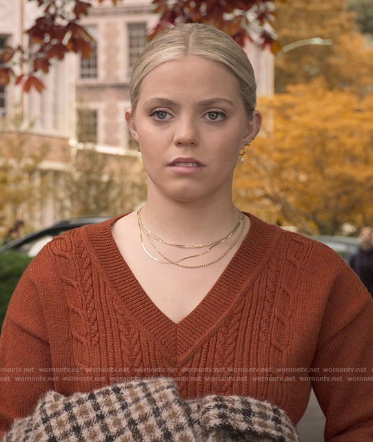 Leighton’s rust brown cable knit v-neck sweater on The Sex Lives of College Girls