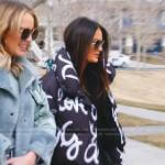 Lisa’s black graphic print puffer jacket on The Real Housewives of Salt Lake City