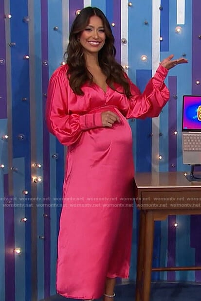 Manuela’s pink satin maternity maxi dress on The Price is Right
