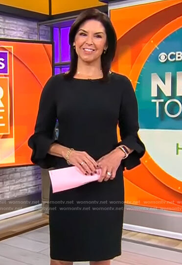 Meg Oliver’s black flared sleeve dress on CBS Mornings