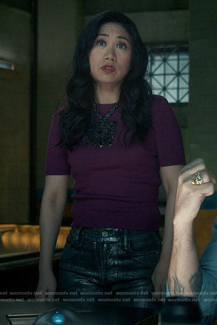 Mel's purple knit top and metallic jeans on The Equalizer