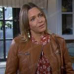 Nicole’s orange floral top and leather jacket on Days of our Lives