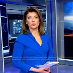 Norah’s blue asymmetric peplum top on CBS Evening News