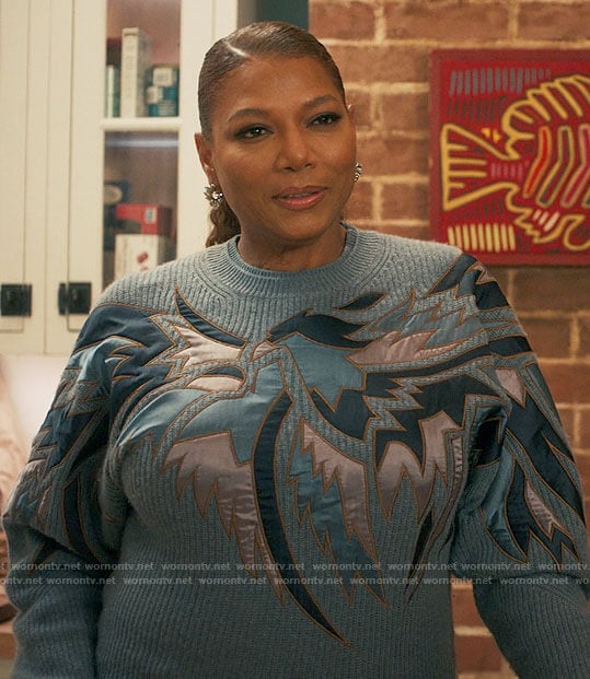 Robyn's blue eagle embroidered sweater on The Equalizer