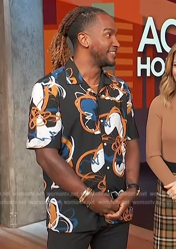 Scott’s black floral short sleeve shirt on Access Hollywood