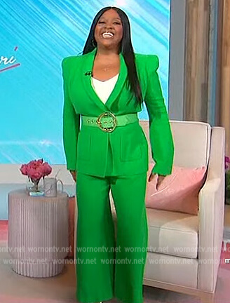 Sherri’s green blazer and pants on Sherri