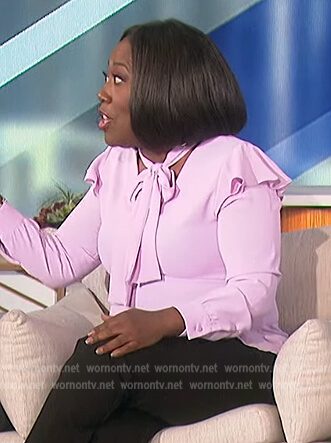 Sheryl’s pink tie neck blouse on The Talk