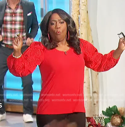 Sheryl’s red floral applique top on The Talk
