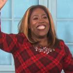 Sheryl’s red plaid embellished sweater on The Talk