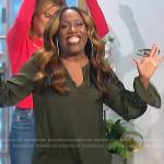 Sheryl’s green studded cuff blouse on The Talk