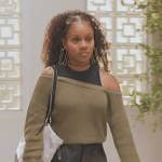 Simone’s green off shoulder sweater on All American Homecoming