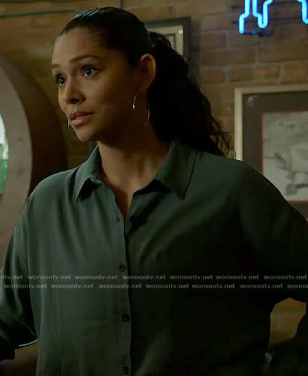 Stella’s green button down top on Chicago Fire