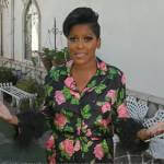 Tamron’s black floral print feather cuff top and pants on Tamron Hall Show