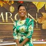 Tamron’s green floral satin mini dress on Tamron Hall Show