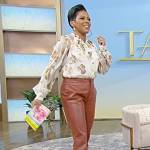Tamron’s floral print blouse and leather pants on Tamron Hall Show