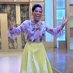 Tamron’s floral print blouse and skirt on Tamron Hall Show