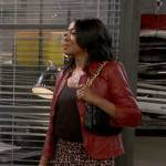 Tina’s red leather jacket and leopard print pants on The Neighborhood