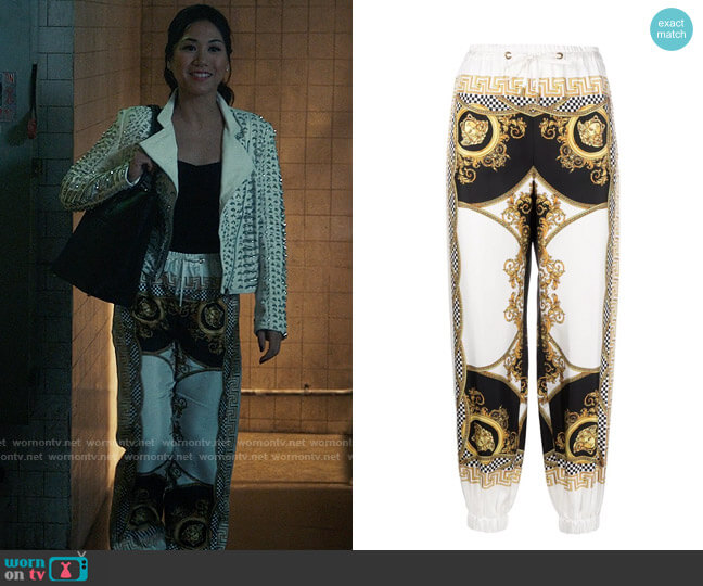 Versace Coupe Des Dieux- print silk pants worn by Melody Bayani (Liza Lapira) on The Equalizer